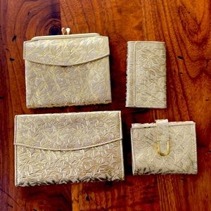 VTG Rolfs Gold 4 piece wallet set. Brand new!